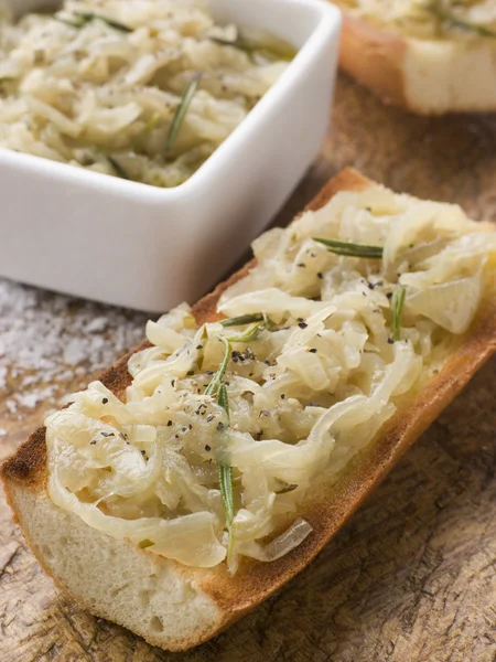 Confit of Onions on Toasted Baguette — Stock Photo, Image