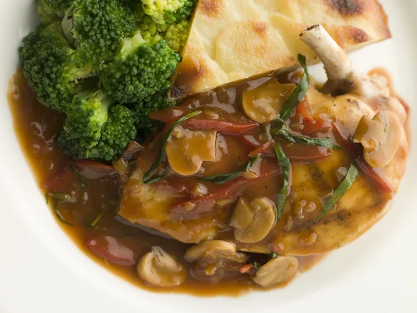 Sauteed Chicken Chasseur with Broccoli and Pomme Anna — Stock Photo, Image