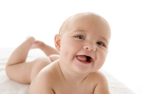 Baby liggande leende — Stockfoto
