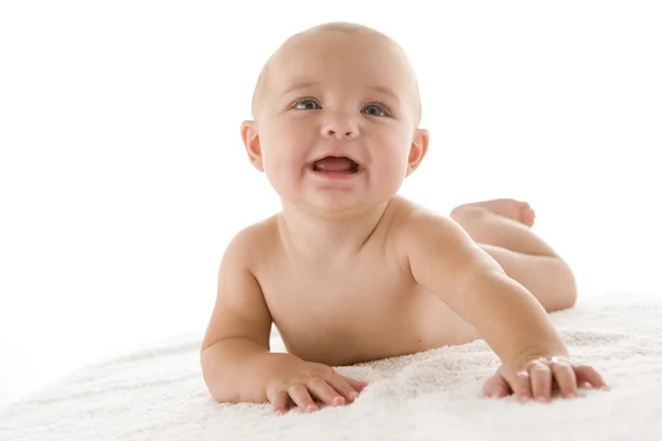 笑みを浮かべて横たわっている赤ちゃん — ストック写真