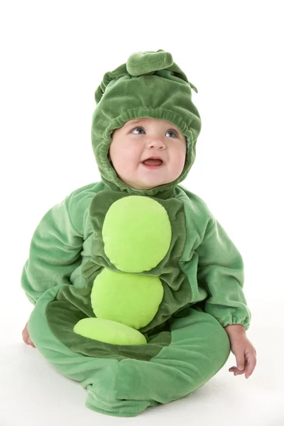 Bebé con guisantes en traje de vaina — Foto de Stock