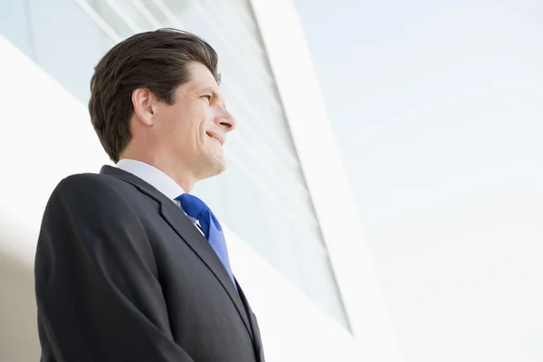 Businessman Standing Outdoors Building Smiling — Stock Photo, Image