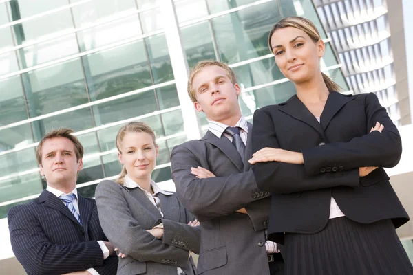 Four Businesspeople Standing Outdoors Smiling — Stock Photo, Image