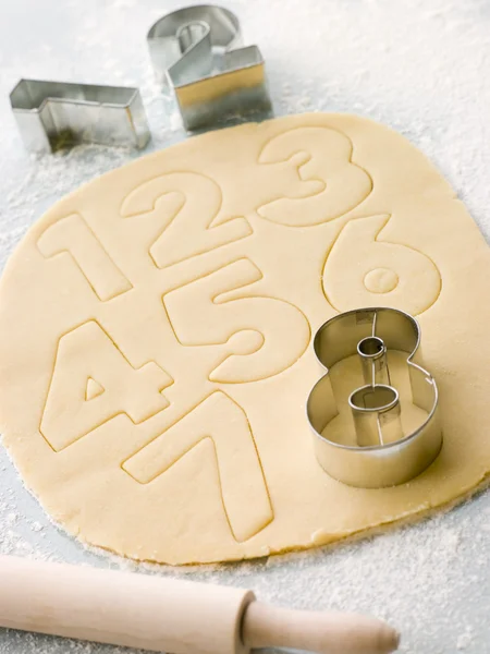 Cutting Out Number Shape Biscuits — Stock Photo, Image