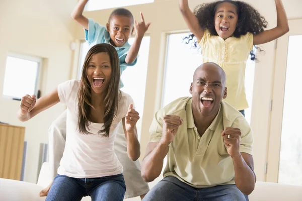 Family Living Room Cheering Smiling — Stock Photo, Image