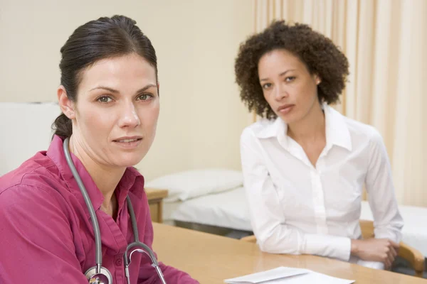 Woman Doctor Office Frowning — Stock Photo, Image