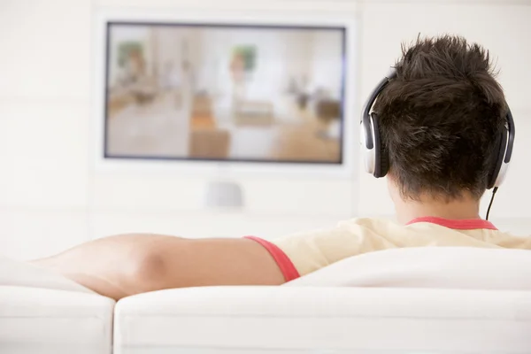 Man Living Room Watching Television Wearing Headphones — Stock Photo, Image
