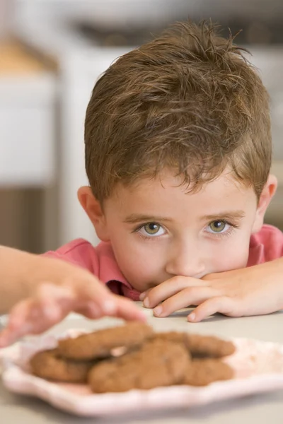 Boy Taking Biscuit Plate — Stockfoto