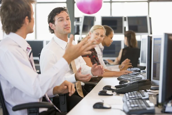 Five Businesspeople Office Space Ball Being Thrown Stock Picture