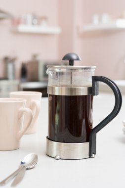 Coffee pot on kitchen counter clipart