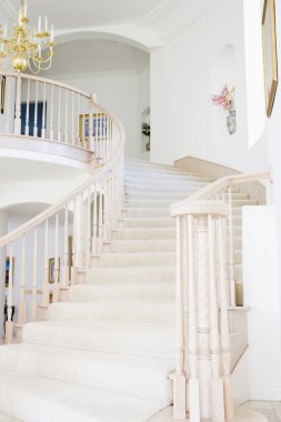 Empty staircase in luxurious home clipart