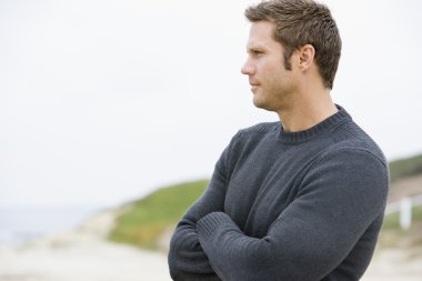 Man standing at beach clipart