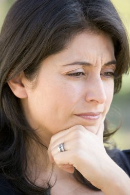 Head shot of worried woman clipart