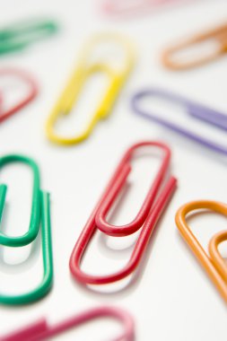 Studio Shot Of Multi Colored Paperclips clipart