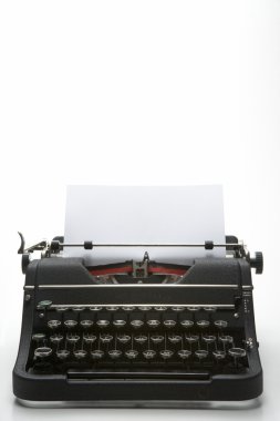 Studio Shot Of An Old Fashioned Typewriter clipart