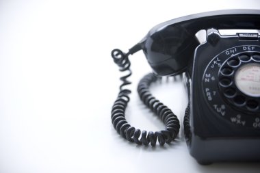 Studio Shot Of A Black Rotary Phone clipart