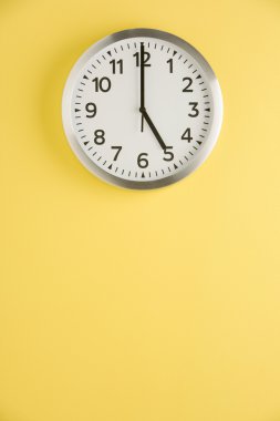 Office Clock Displaying 5 O'clock clipart