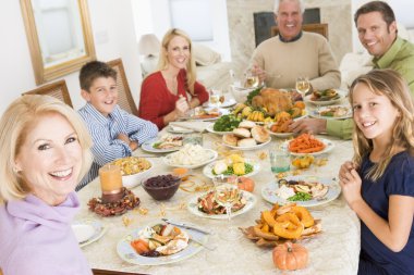 Family All Together At Christmas Dinner clipart