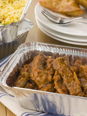 Indian Take Away- Beef Madras, Pilau Rice And Vegetable Samosa clipart