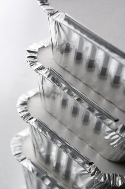 Stack Of Foil Take Away Containers clipart