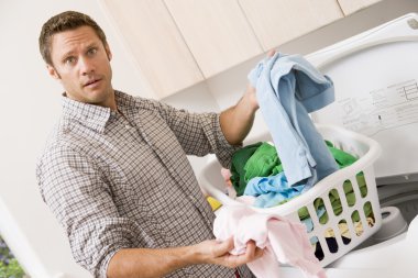Man Doing Laundry clipart