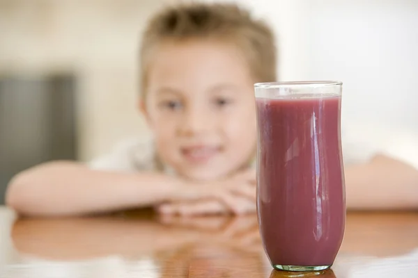 Young Boy Indoors Focus Juice Glass — Stock Photo, Image