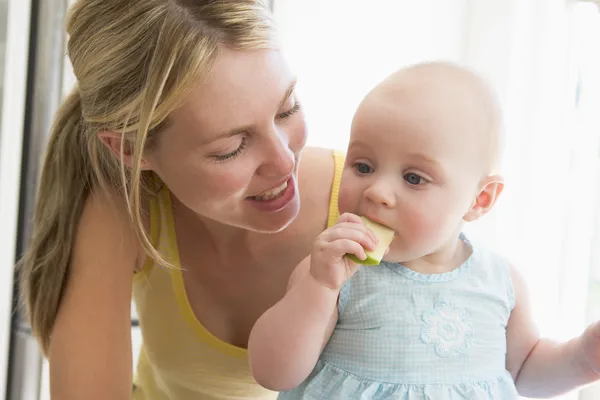 Mother Baby Kitchen Eating Apple — Stock Photo, Image
