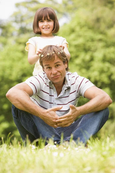 Father Daughter Sitting Outdoors Flowers Smiling — Stockfoto