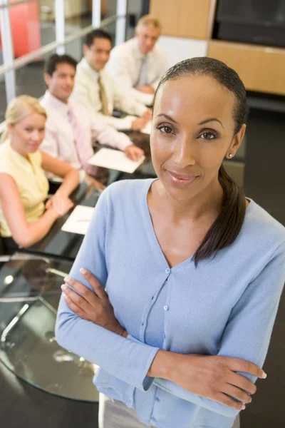 Businesswoman Four Businesspeople Boardroom Table Bac — Stock Photo, Image