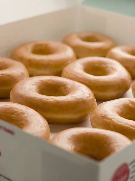 Iced Ring Doughnuts In A Tray — Stock Photo, Image