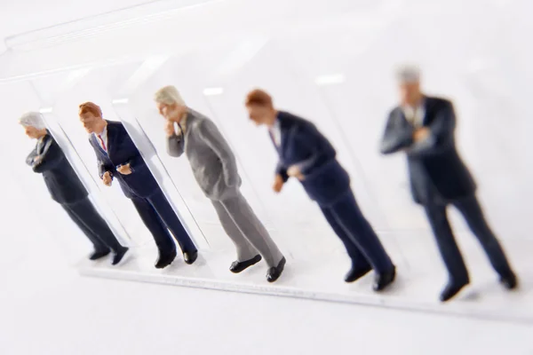 Line Of Businessmen Figurines — Stock Photo, Image