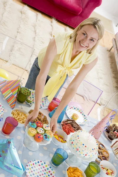 Woman Party Setting Out Food Smiling — Stock Photo, Image
