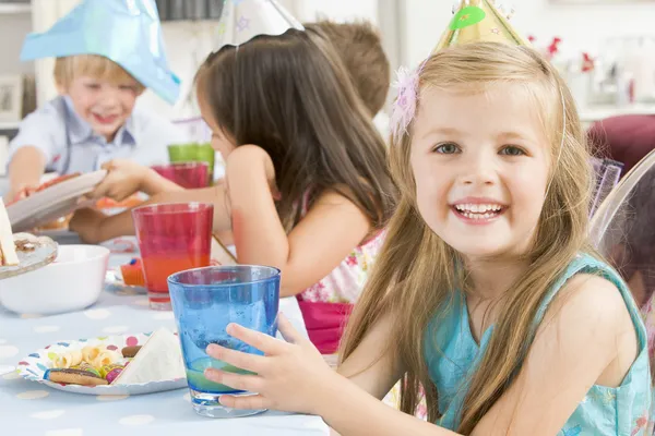 Young Girl Party Sitting Table Food Smiling — Stock Photo, Image