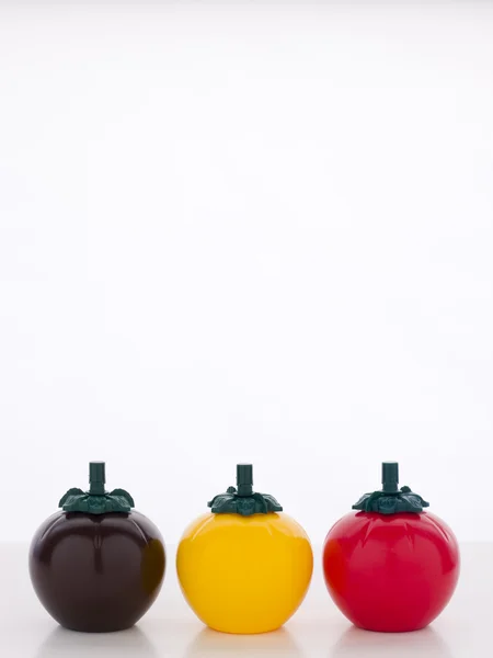 stock image BBQ, Mustard And Ketchup Sauce Bottles, Three Tomato Shaped Sauc