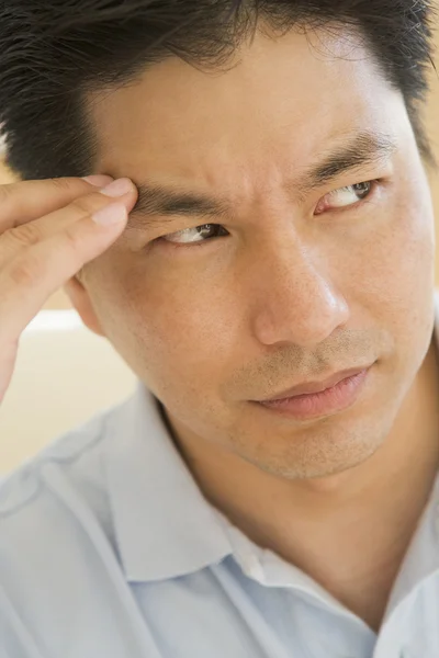 Man med huvudvärk — Stockfoto