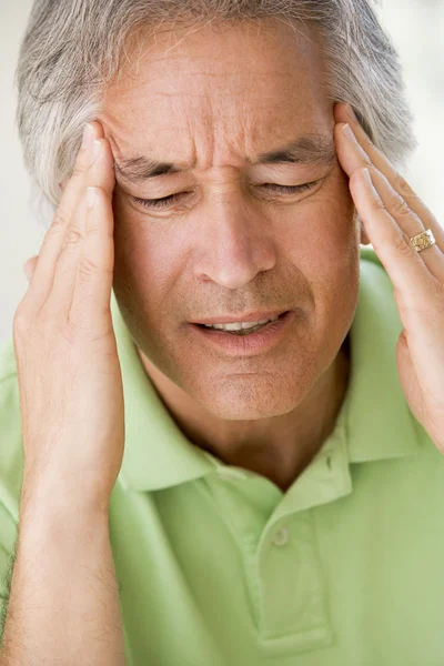 Muž s bolestí hlavy — Stock fotografie