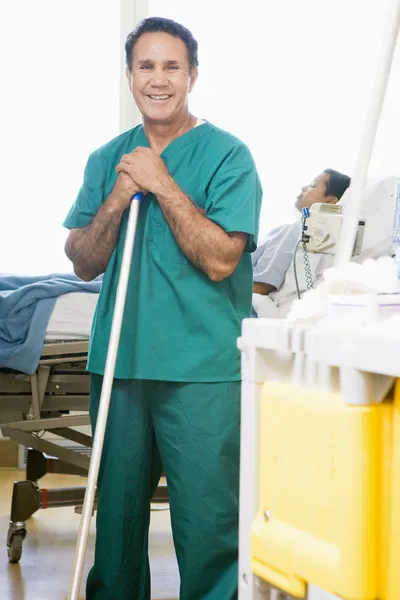An Orderly Mopping The Floor In A Hospital Ward — Stock Photo, Image