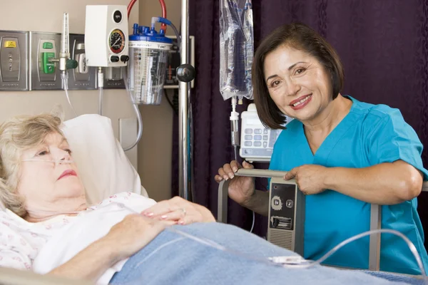 Doctor Checking Senior Woman Patient — Stock Photo, Image