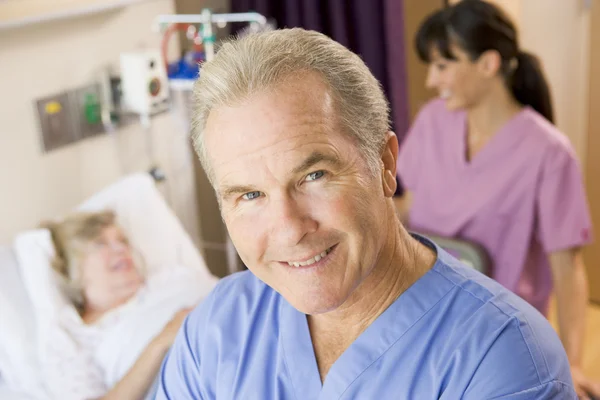 Doctor Standing Patients Room Nurse Checking Patient — Stock Photo, Image