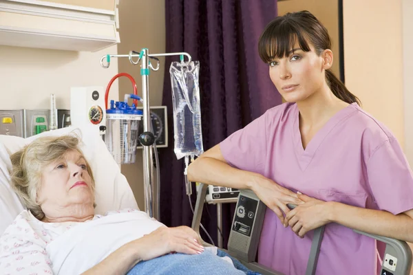 Nurse Checking Patient Lying Hospital Bed — Stock Photo, Image