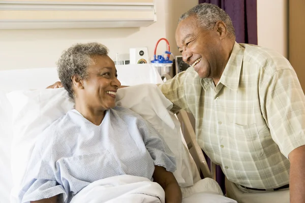 Senior Couple Smiling Each Other Hospital — Stock Photo, Image