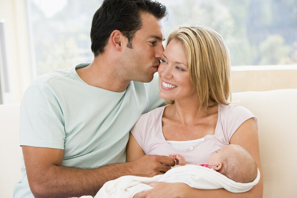 Couple Living Room Baby Smiling Royalty Free Stock Photos