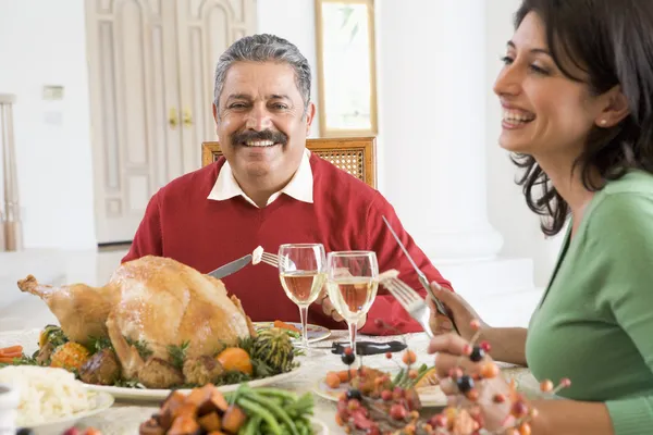 Father And His Adult Daughter Sitting Down For Christmas Dinner — Stock Photo, Image