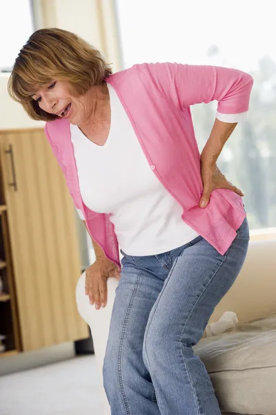 Woman With Back Pain Stock Image