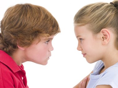 Brother and sister staring at each other clipart