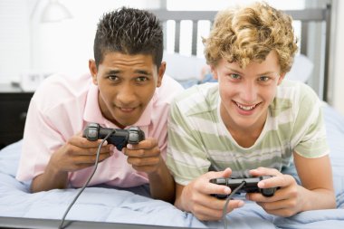 Teenage Boys Playing Video Games clipart