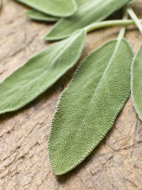 Sage Leaves On Chopping Board clipart