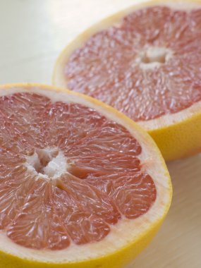 Halved Pink Grapefruit clipart