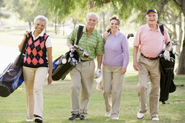 Portrait Of Four Friends Enjoying A Game Golf clipart