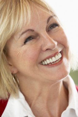 Middle Aged Woman Smiling Cheerfully clipart